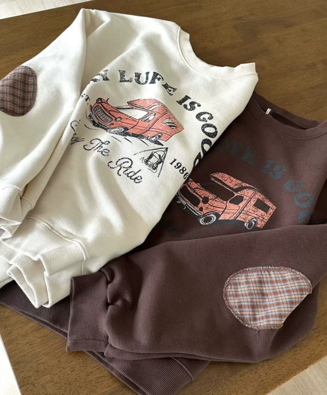 韓 肘拚格文汽車上衣 2色