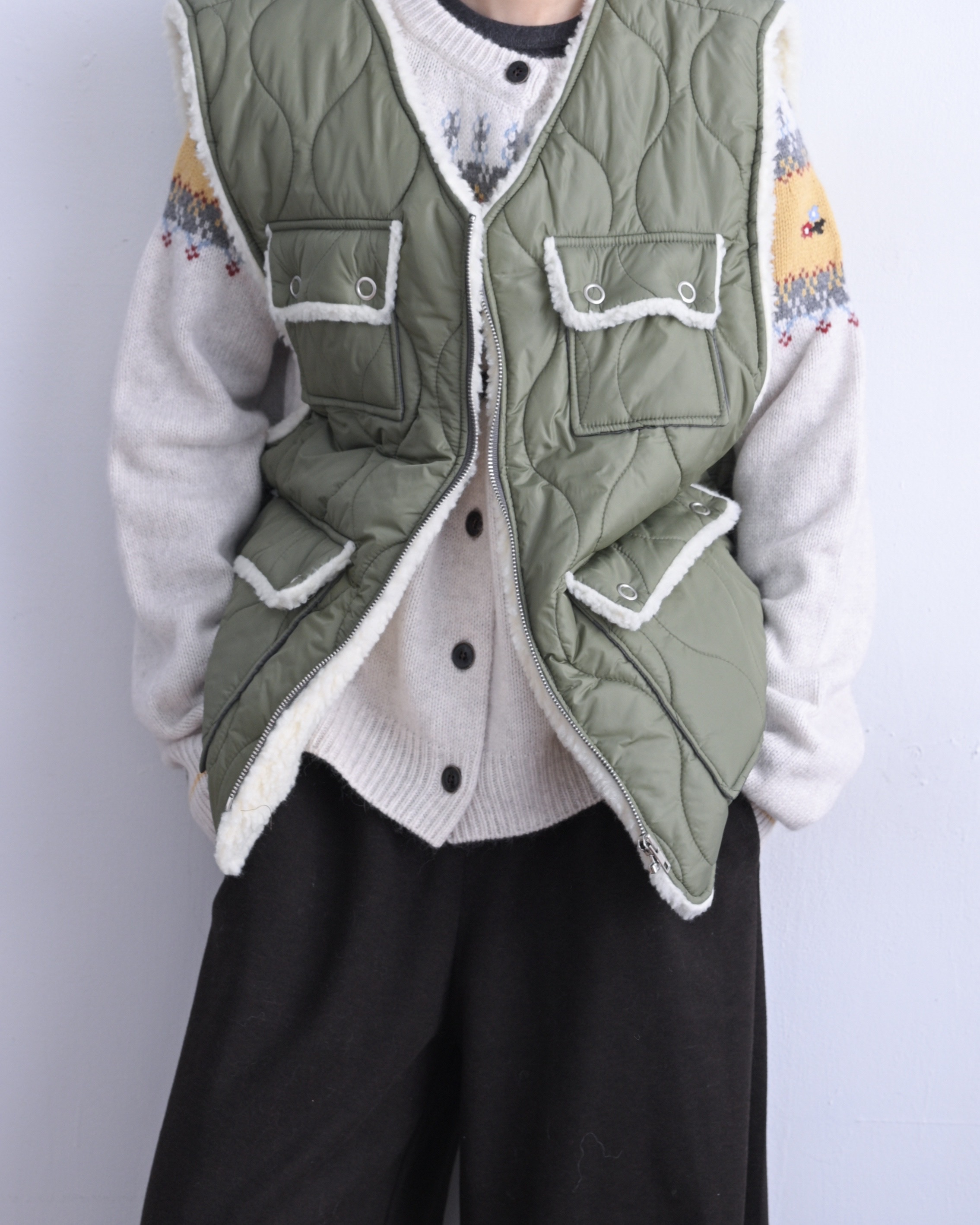 韓 壓紋V領毛毛背心